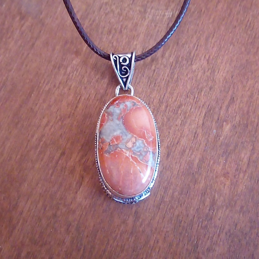 New Hand Crafted Orange brecciated mookaite pendant. 2”. Never worn.